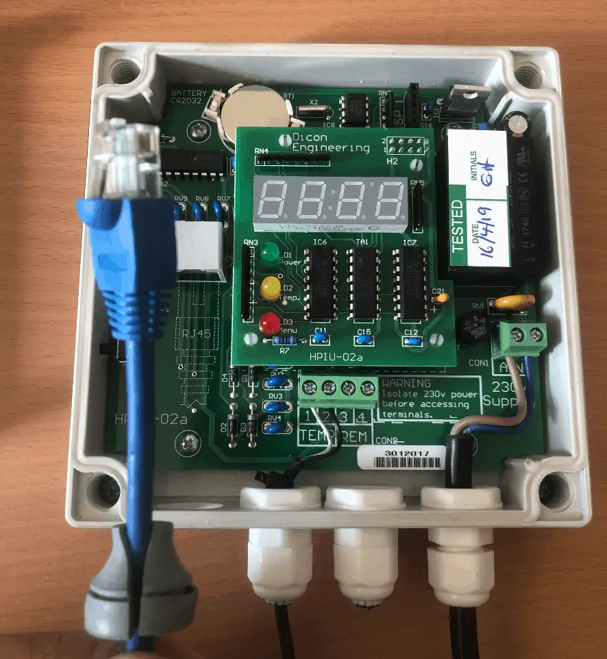 Removed patch cable from inside the Reclaim Energy heat pump controller