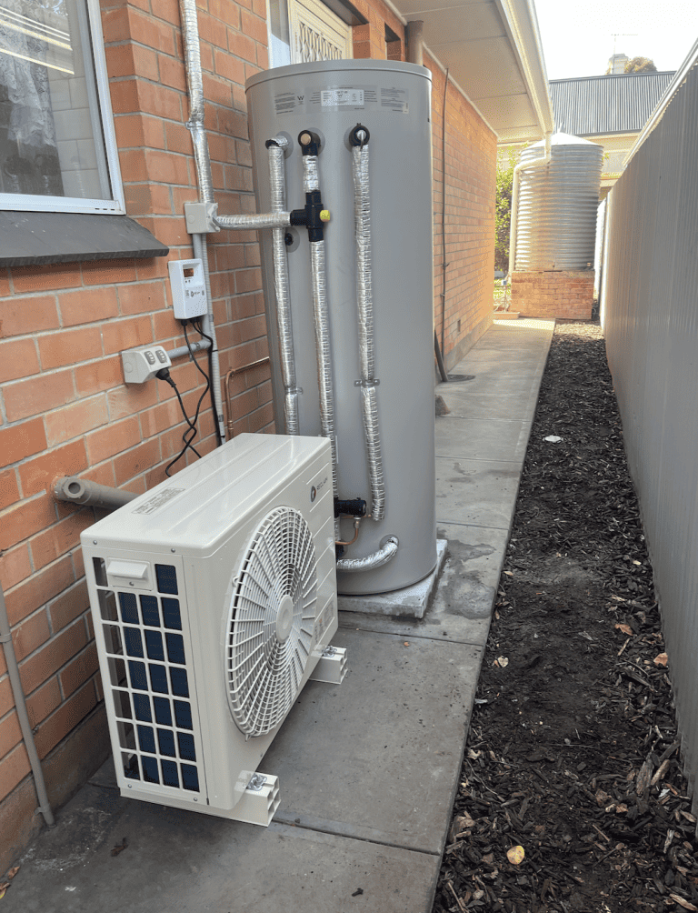 Reclaim Energy Co2 heat pump installed next to tank